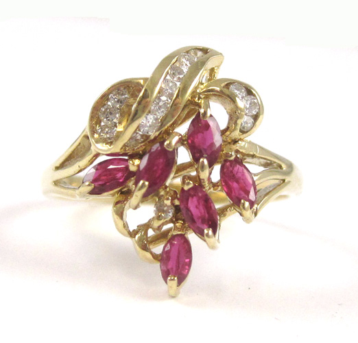 Appraisal: RUBY DIAMOND AND FOURTEEN KARAT GOLD RING set with six