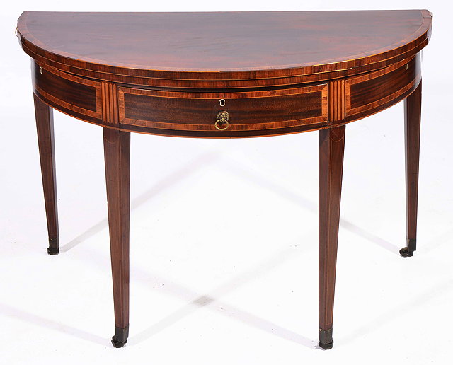 Appraisal: A GEORGE III MAHOGANY 'D' SHAPED FOLD OVER CARD TABLE