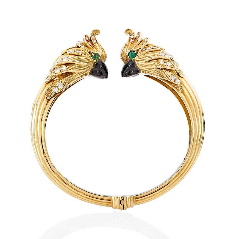 Appraisal: FRENCH DIAMOND GEM-SET YELLOW GOLD COCKATIEL BRACELET The confronted cockatiel