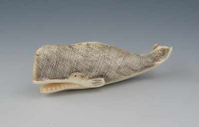 Appraisal: A Carved Ivory Netsuke of a Sperm Whale Highlighted in