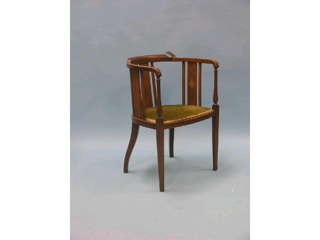 Appraisal: An Edwardian inlaid mahogany drawing room elbow chair tub-shape with