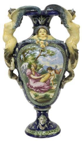 Appraisal: Italian majolica vase with winged female handles protruding putti mask