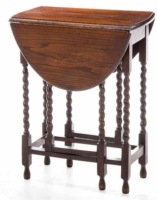 Appraisal: English oak gateleg table early th century oval top with