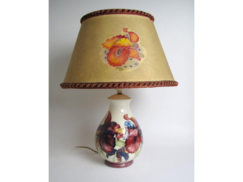 Appraisal: A Moorcroft Orchid pattern table lamp on ivory ground cm