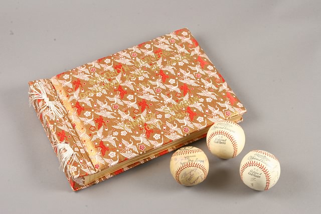 Appraisal: Grouping including photo album and three autographed baseballs related to