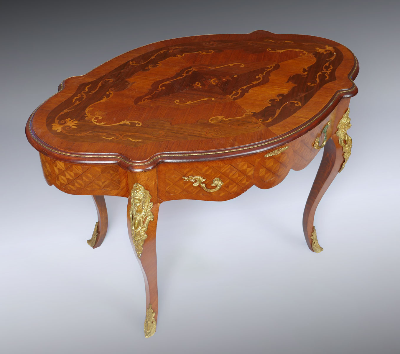 Appraisal: INLAID MARQUETRY PARLOR TABLE Single drawer parlor table having marquetry