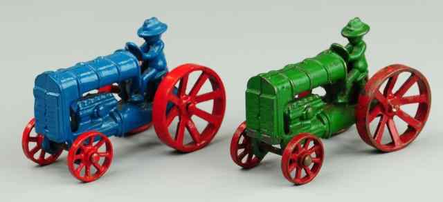 Appraisal: LOT OF TWO DENT TRACTORS Includes cast iron farm tractors