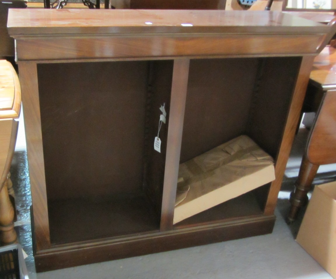 Appraisal: A modern mahogany bookcase with shelves and brackets