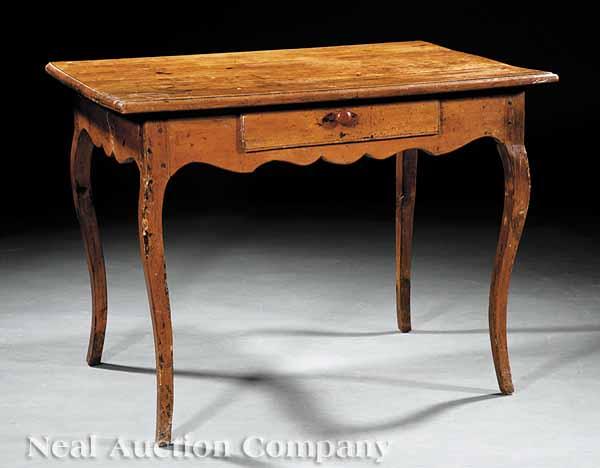 Appraisal: A Provincial Louis XV Fruitwood Side Table th c molded