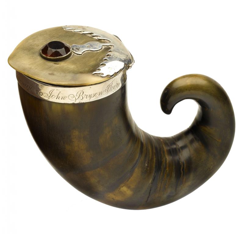 Appraisal: A SCOTTISH SILVER-MOUNTED HORN SNUFF MULL the lid with thistle