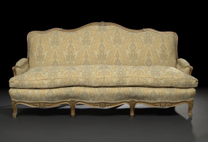 Appraisal: Provincial Louis XV-Style Fruitwood Sofa early th century the domed