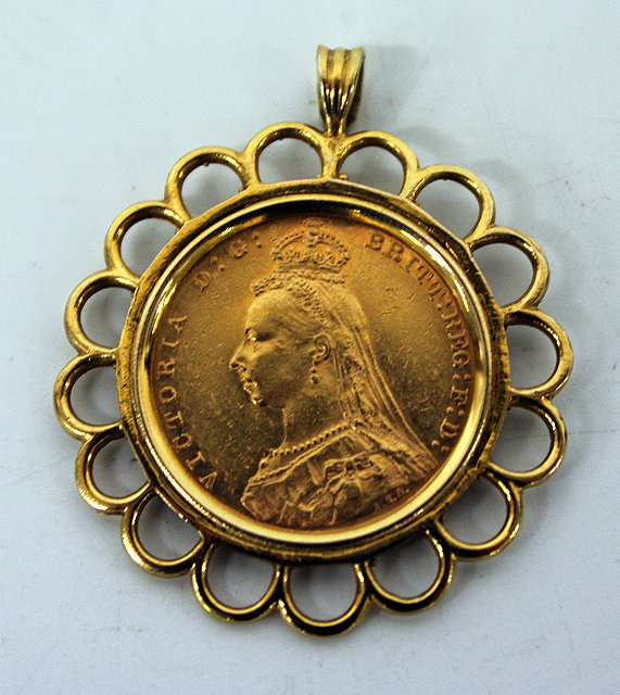 Appraisal: A VICTORIAN SOVEREIGN dated with a ct gold mount