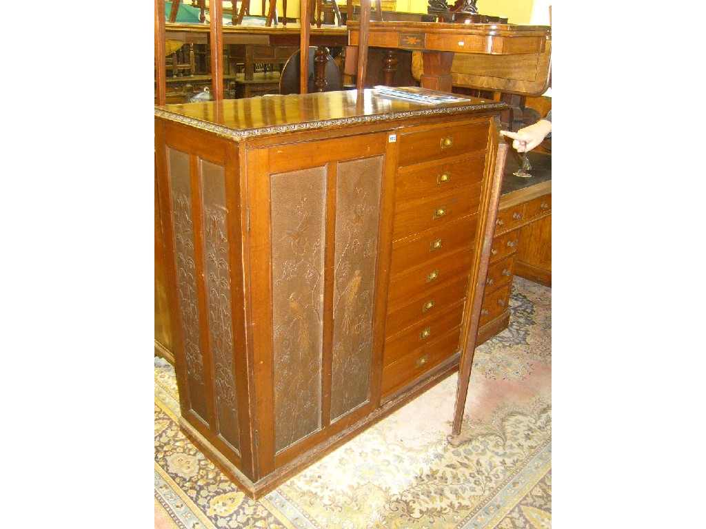 Appraisal: A late Victorian walnut side cupboard enclosed by a pair