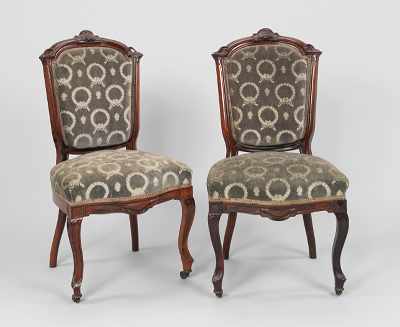 Appraisal: A Pair of Victorian Walnut Parlor Chairs Each upholstered in