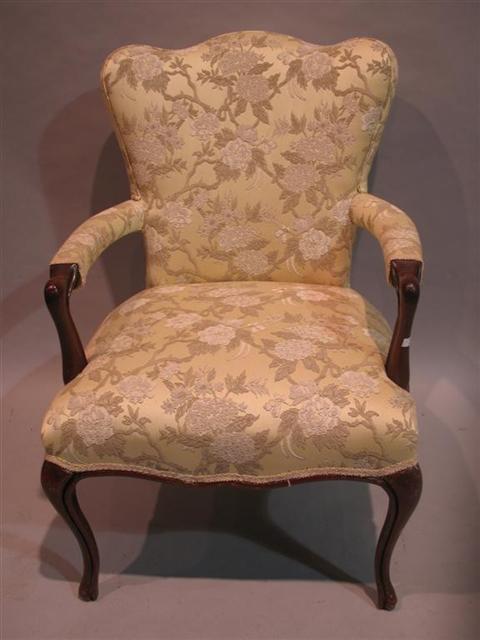 Appraisal: VICTORIAN STYLE MAHOGANY ARMCHAIR th century floral pale green upholstery