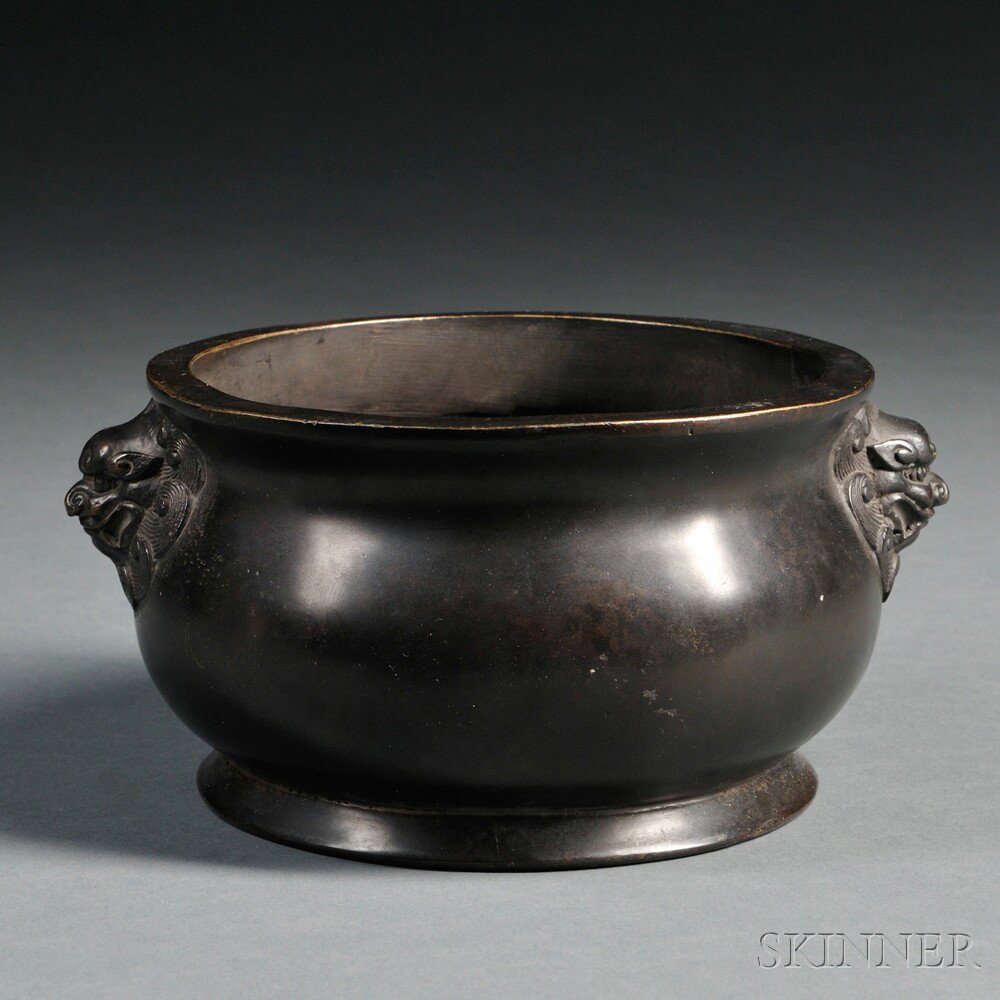 Appraisal: Bronze Censer China ovoid cast with a pair of lion-head