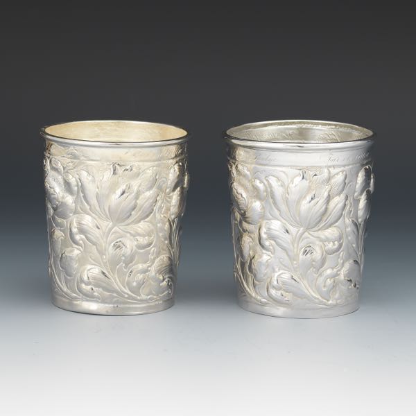 Appraisal: PAIR OF STERLING SILVER REPOUSSE FLORAL JULEP CUPS - x