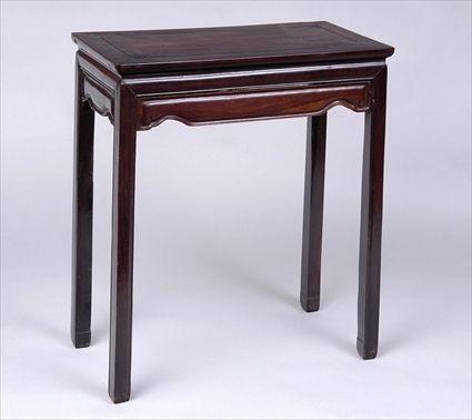 Appraisal: CHINESE CARVED HARDWOOD SIDE TABLE The rectangular top above paneled