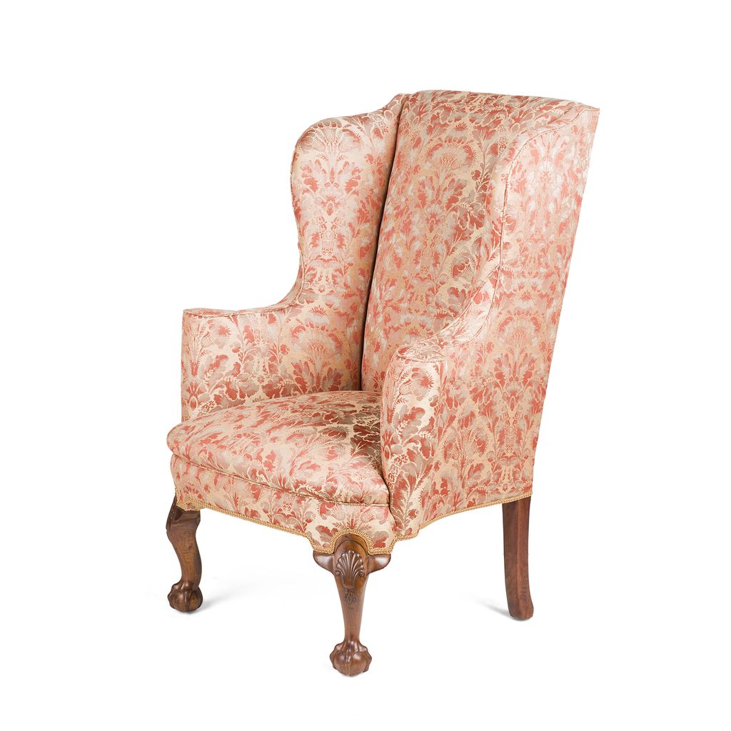 Appraisal: GEORGE II STYLE WINGBACK ARMCHAIR TH CENTURY the straight padded