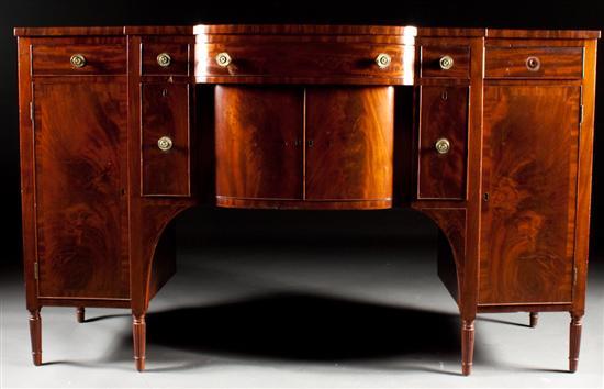 Appraisal: Late Federal carved mahogany shaped-front sideboard Pennsylvania circa in H