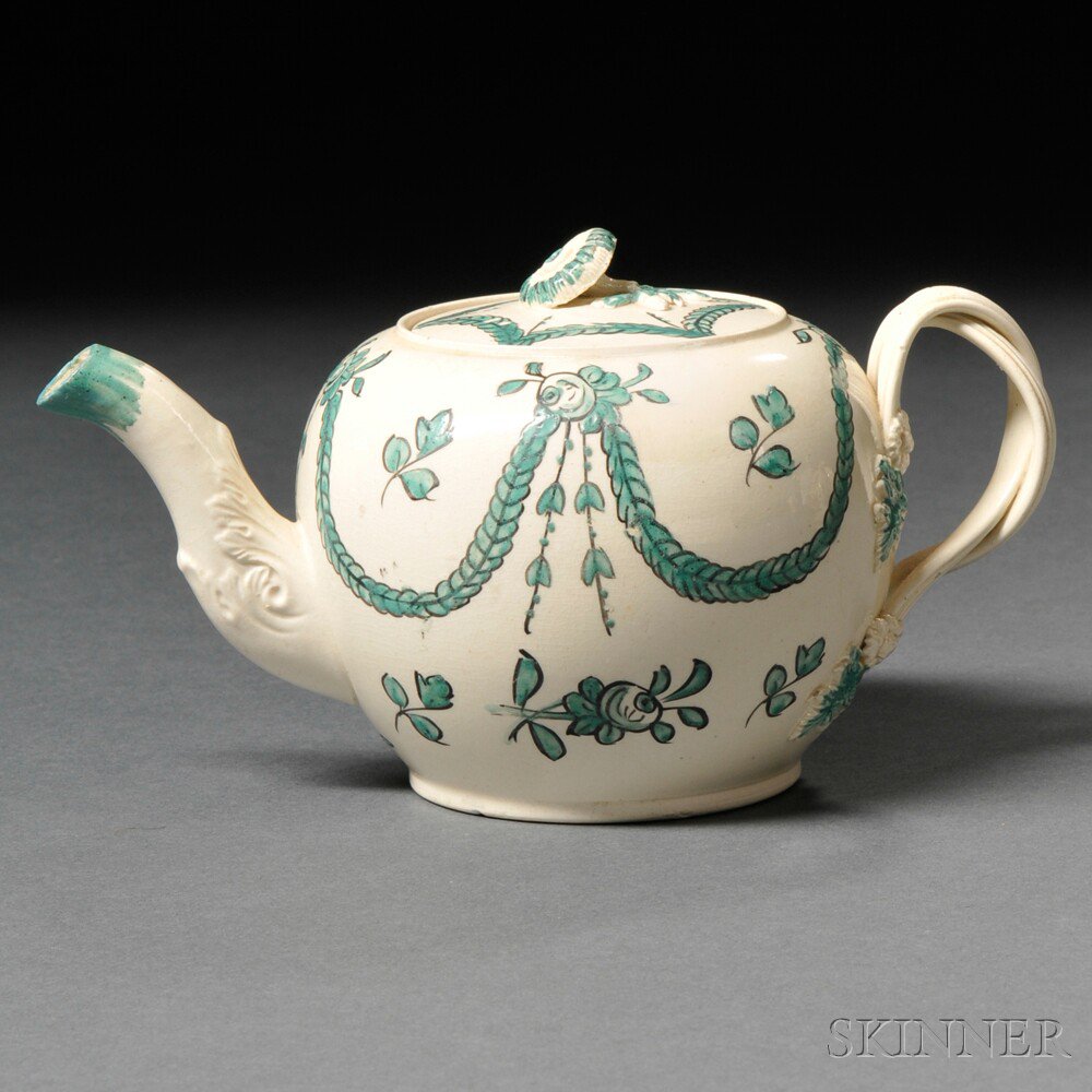 Appraisal: Staffordshire Cream-colored Earthenware Teapot and Cover England c globular with