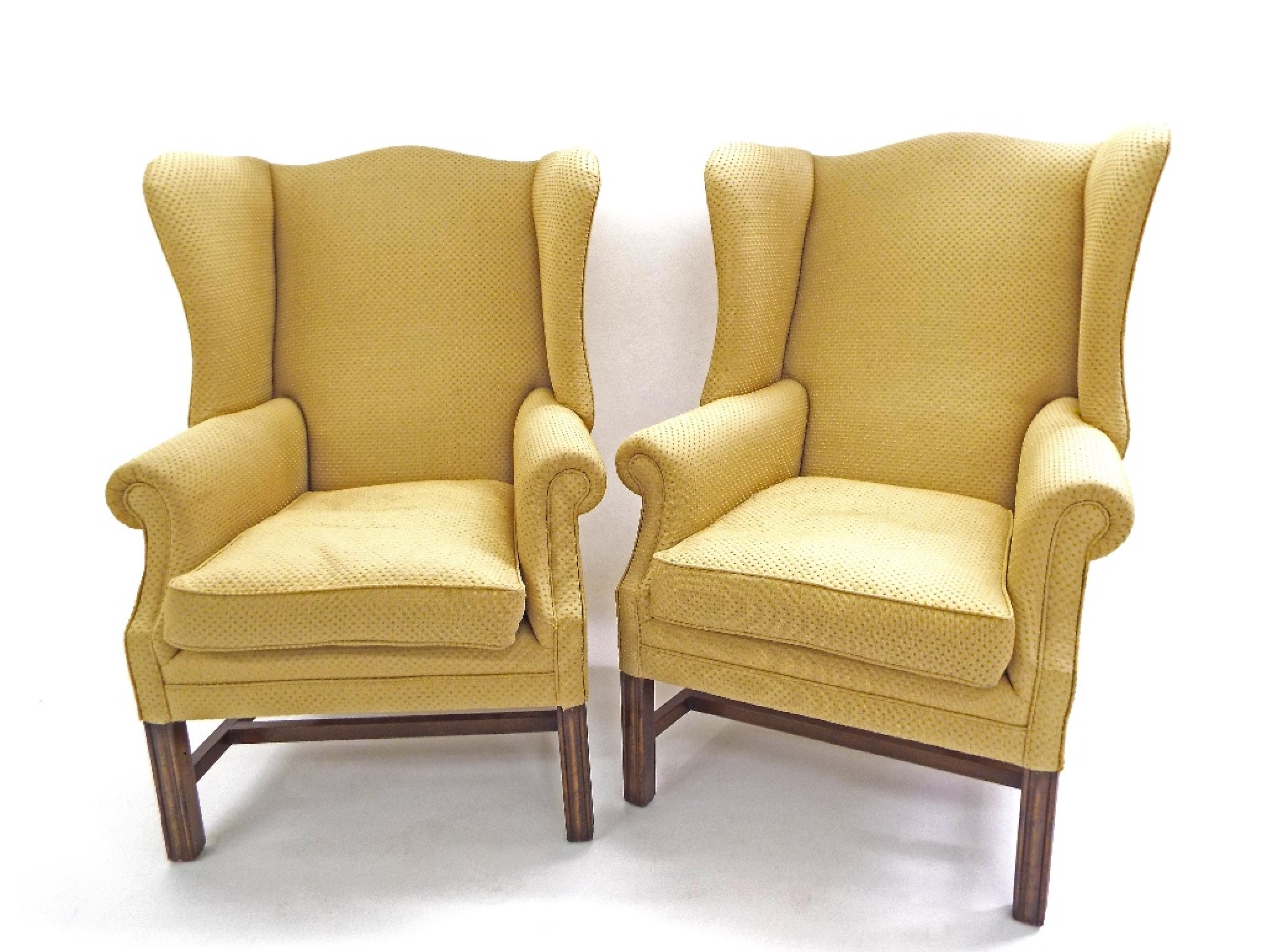 Appraisal: Good pair of Georgian style wingback armchairs with quality yellow