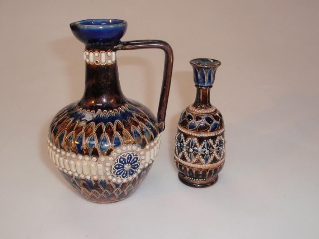 Appraisal: A Doulton Lambeth stoneware flagon decorated by Eleanor Garbet with