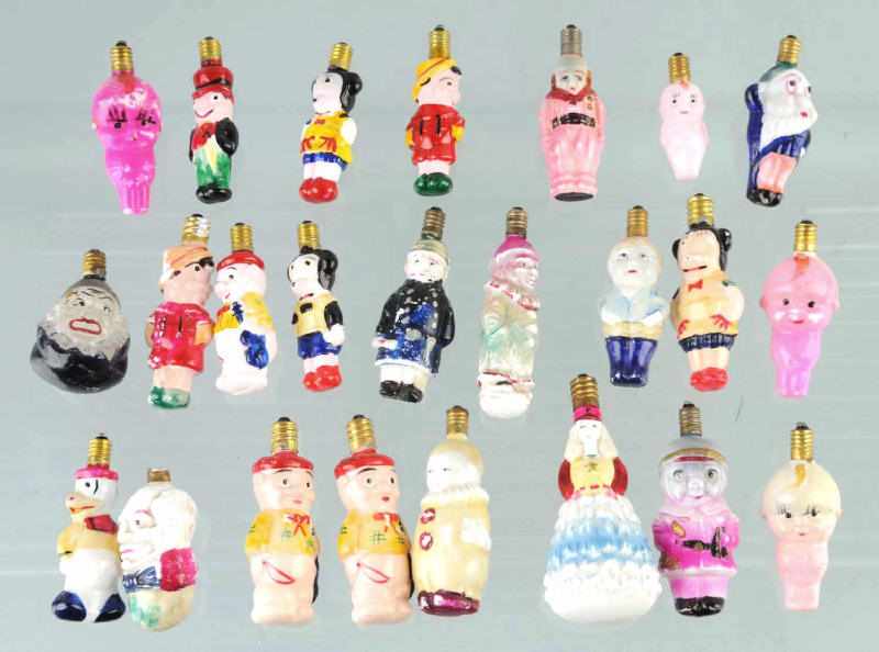 Appraisal: Lot of Figural Christmas Light Bulbs Description Includes some comic