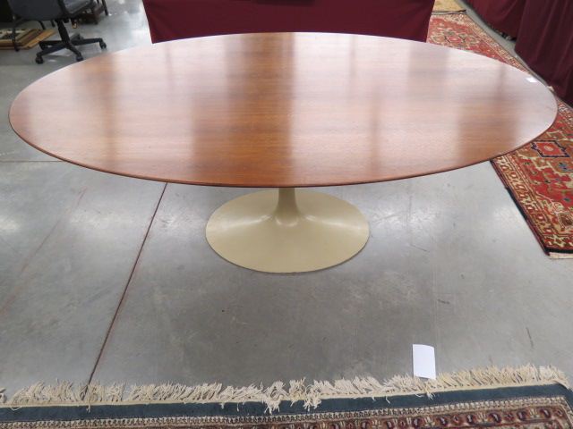 Appraisal: Eero Saarinen Teak Tulip Table for Knoll oval top wide