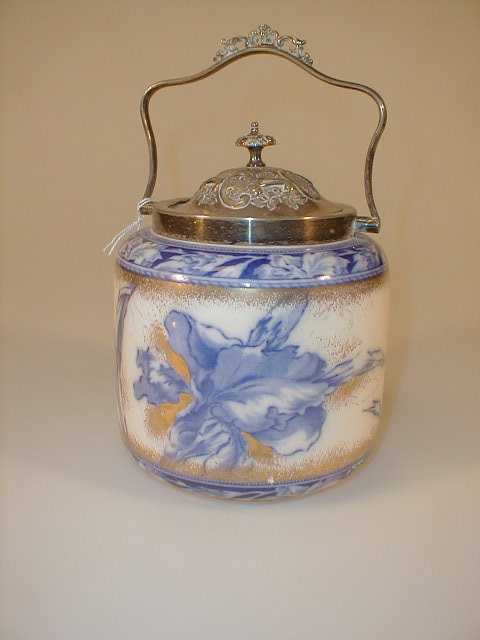 Appraisal: An early thC German pottery biscuit barrel decorated in flo-blue