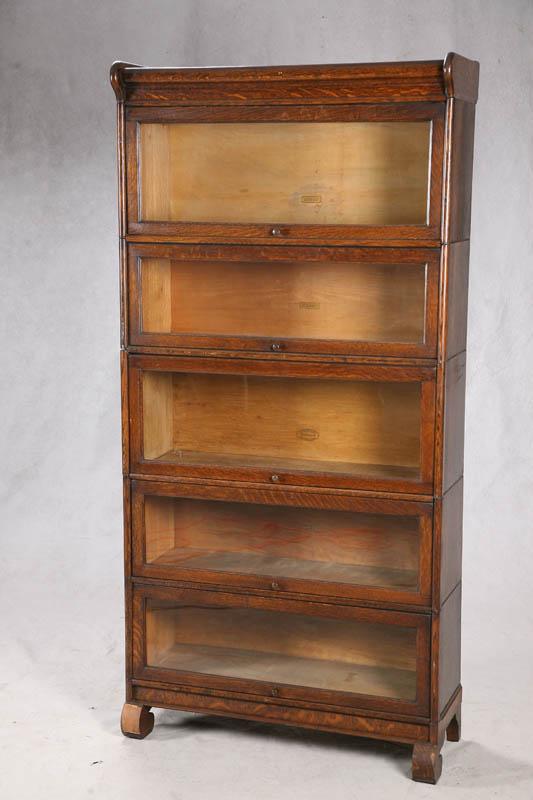 Appraisal: STACKED BOOKCASE Five section oak bookcase signed Widman h w