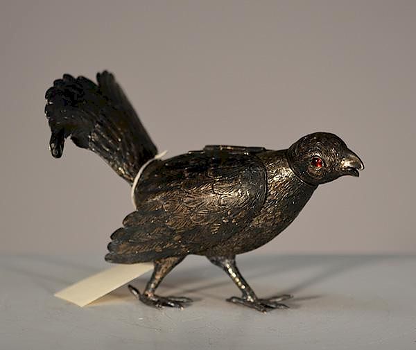 Appraisal: Bird Form Pepper Pot European silver hinged wings bird form