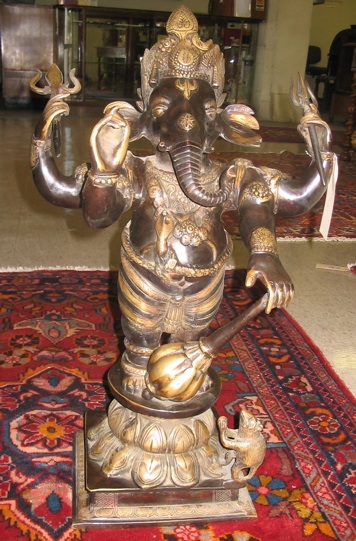 Appraisal: BRONZE FIGURE OF GANESHA the Hindu elephant-head god of domestic