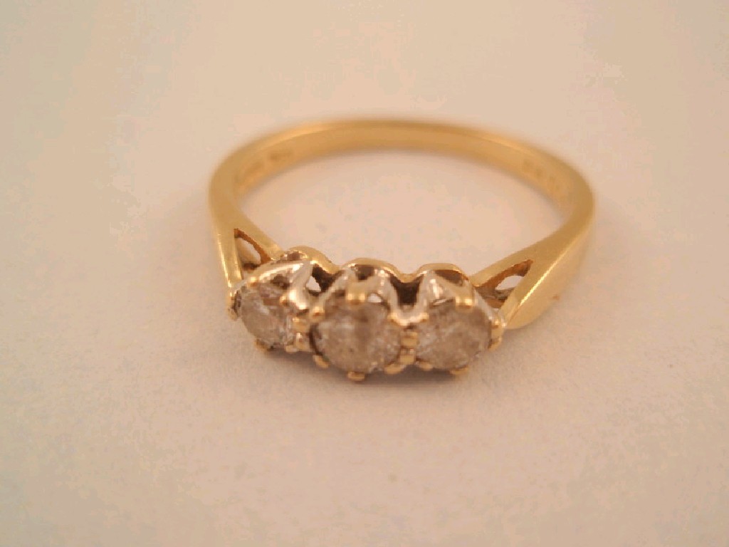 Appraisal: A three stone diamond ring mounted total estimated weight ct