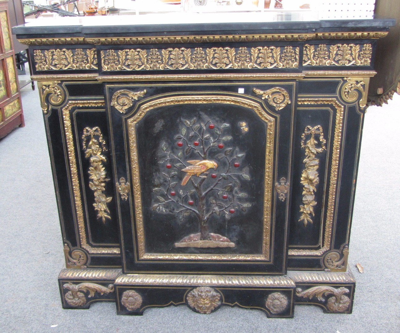 Appraisal: A th century gilt metal mounted brass inlaid hard stone