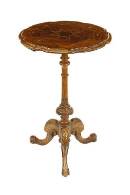 Appraisal: A Victorian walnut tripod table by Urquhart and Adamson Liverpool