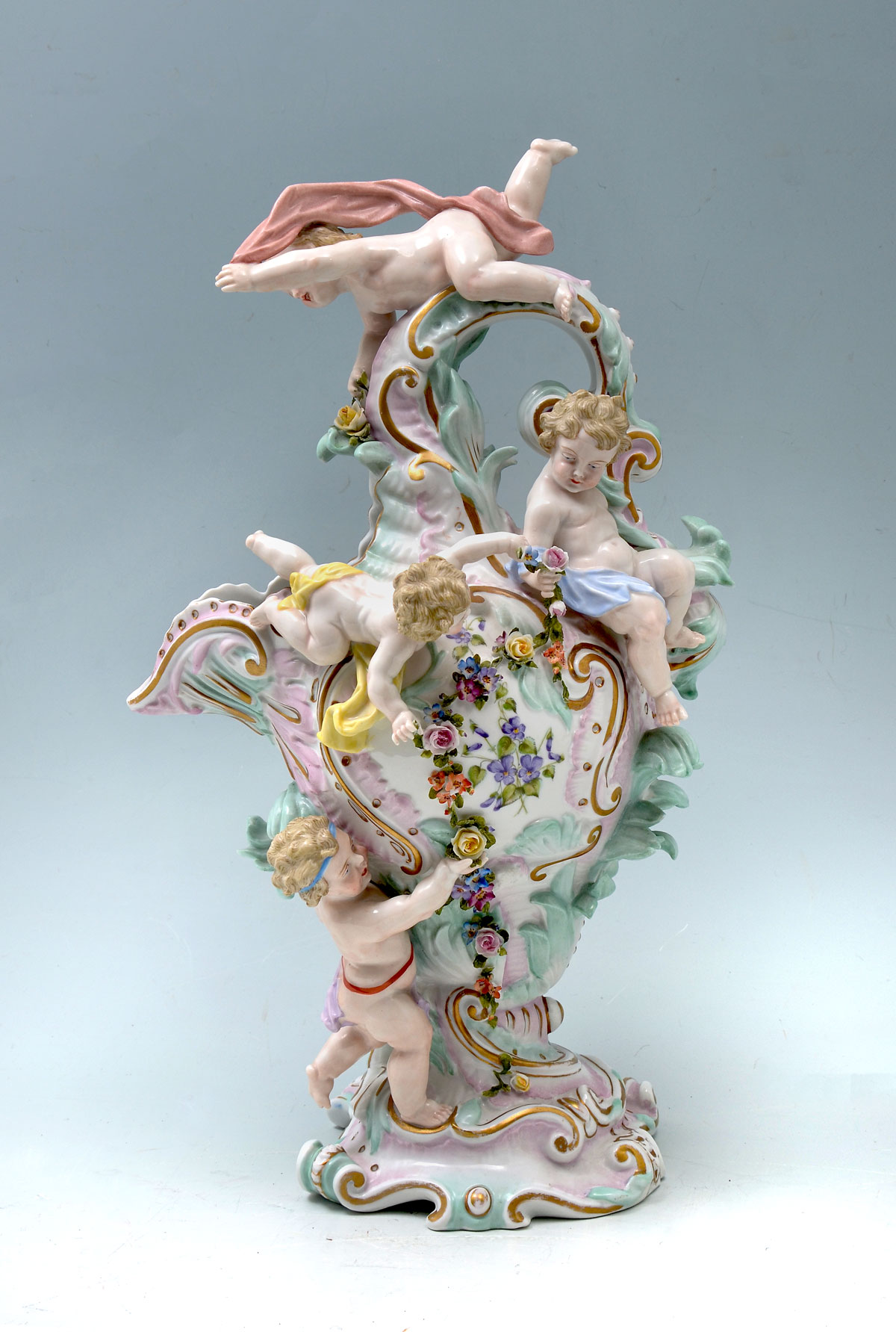 Appraisal: GERMAN MEISSEN STYLE PITCHER WITH CHERUBS Meissen style pitcher having