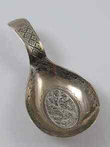 Appraisal: A Georgian silver caddy spoon the fig shaped bowl with