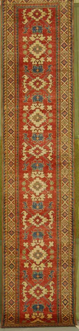 Appraisal: ORIENTAL RUG KAZAK-DESIGN RUNNER ' ' '' Repeated stylized elements