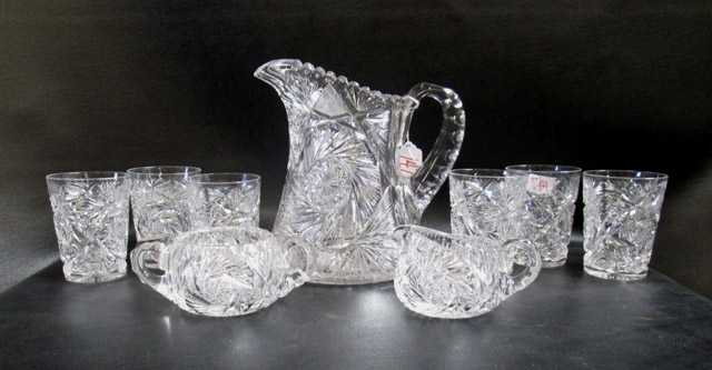 Appraisal: AMERICAN BRILLIANT PERIOD CUT CRYSTAL nine piece set pitcher H