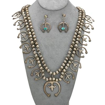 Appraisal: SQUASH BLOSSOM NECKLACE Together with a pair of turquoise earrings