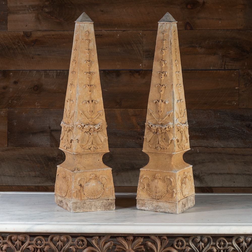 Appraisal: Pair of Cast Stone Obelisks with Shells and Arrows x