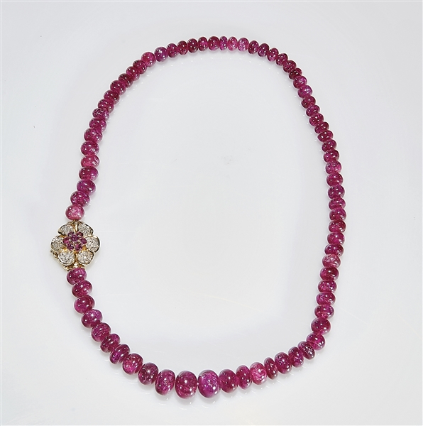 Appraisal: African dyed ruby bead necklace clasp stamped k gross weight