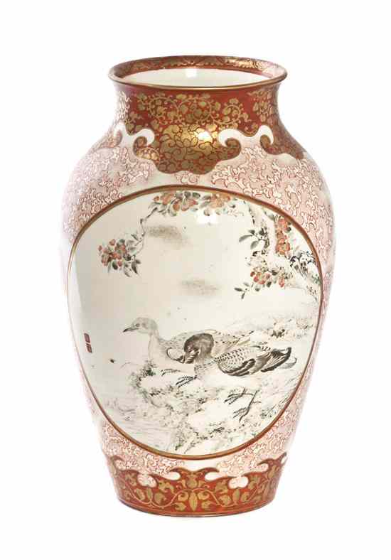 Appraisal: A Japanese Kutani Vase having a circular cartouche with a