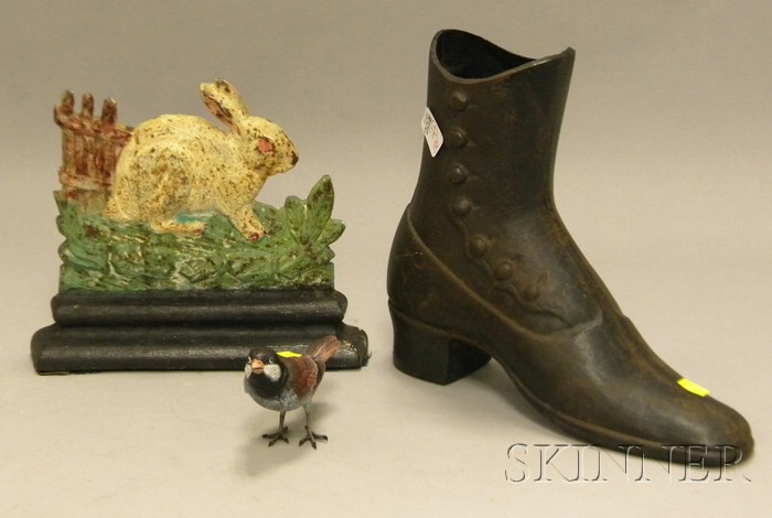 Appraisal: Painted Cast Iron Rabbit Doorstop Boot-form Vase and Painted Bronze