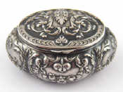 Appraisal: A French hallmarked silver box with embossed decoration approx cm