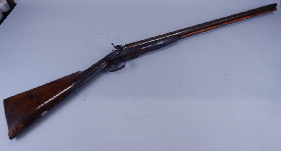 Appraisal: A muzzle loading double barrel shotgun by W C Scott