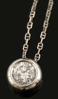 Appraisal: A diamond pendant The round brilliant cut diamond of cts