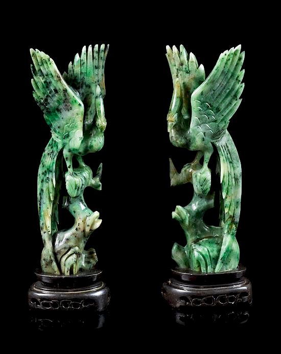 Appraisal: A Pair of Spinach Jade Figures of Birds Height of