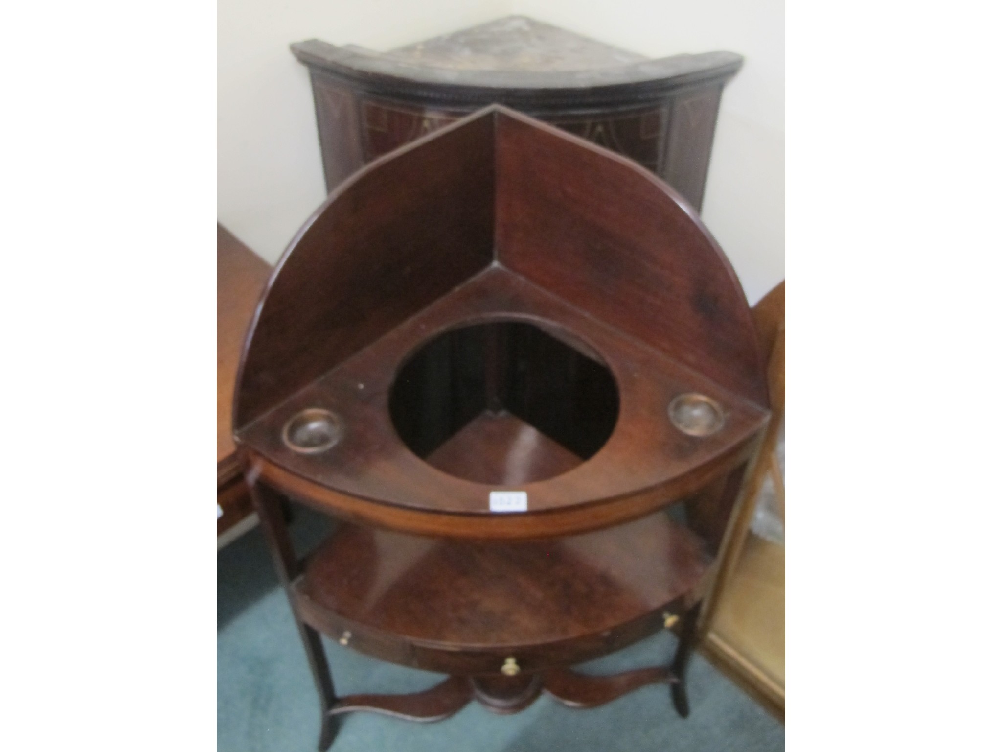 Appraisal: A mahogany hanging corner cupboard and wash stand